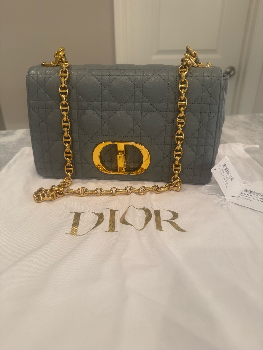 DIOR CARO Medium Quilted Crossbody with Gold CD Clasp.  Color Grey Stone